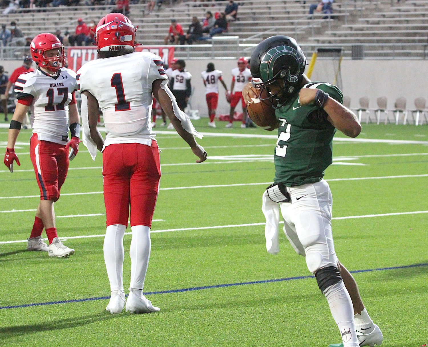 Senior quarterback Jace Wilson (right, pictured celebrating a touchdown during last week's win against Dulles) and the Mayde Creek Rams jumped into the Houston area high school football media poll this week, coming in at No. 19.